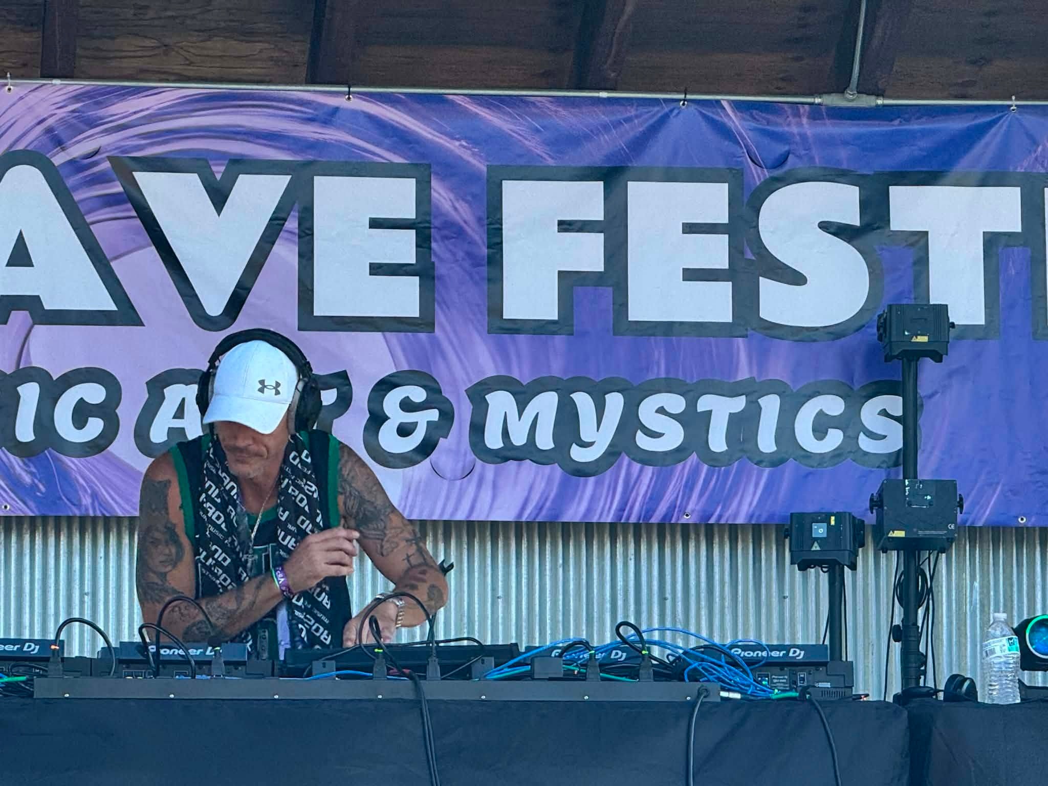 Cloud 9 mixing on Pioneer DJ decks beneath the New Wave Festival banner